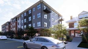 Royersford apartment for rent - A silver car is parked in a parking lot in front of a building.
