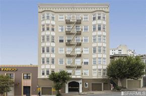 San Francisco apartment for rent - an apartment building with a fire escape on the side of a street