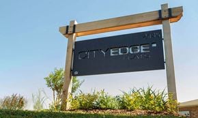 Murfreesboro apartment for rent - A sign for City Edge in front of a clear blue sky.