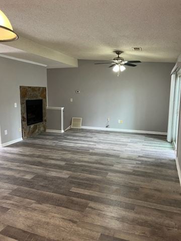 Newnan house for rent - a living room with a wood floor and a ceiling fan