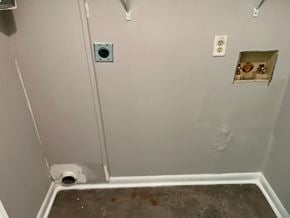 Newnan house for rent - A bathroom with a white toilet and a white wall.