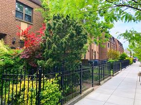 Washington apartment for rent - a sidewalk in front of a wrought iron fence
