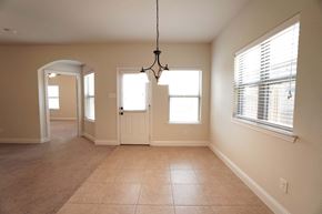 Greenville house for rent - a view of the dining room and entryway from the living room
