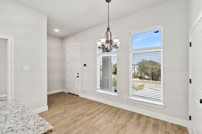 Spring Branch apartment for rent - a living room with two windows and a door