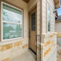 Spring Branch apartment for rent - the front door of a house with two large windows