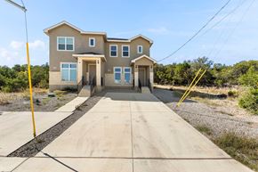 Spring Branch apartment for rent - a large house with a long sidewalk in front of it