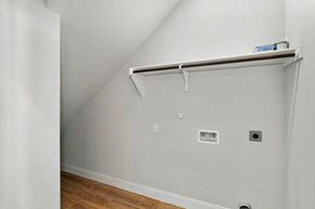 Spring Branch apartment for rent - a bedroom with a white wall and a sliding closet door