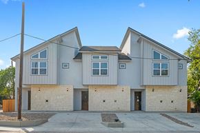San Antonio apartment for rent - front view of a house with brick and gray exterior
