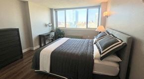 Philadelphia apartment for rent - a bedroom with a bed and a window
