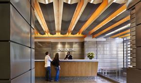 Philadelphia apartment for rent - a man and woman standing at the front desk of a hotel lobby
