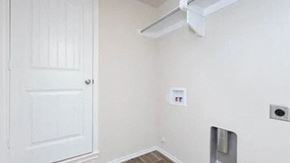 Odessa house for rent - an empty room with a white door and a white wall