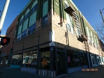 Grand Island apartment for rent - a tall brick building on the side of a street