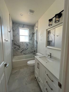 Phoenix apartment for rent - a small bathroom with a shower and a sink and a toilet