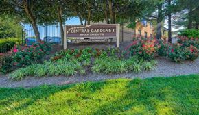 Capitol Heights apartment for rent - a park with flowers and a sign for central gardens apartments