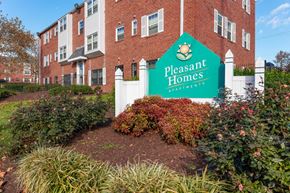 Seat Pleasant apartment for rent - a building with a sign in front of it