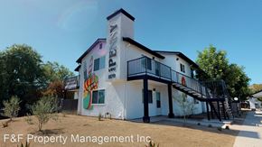 El Cajon apartment for rent - the facade of a building with a mural on the side