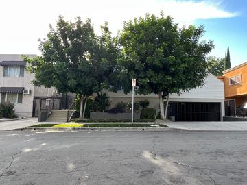 Sherman Oaks apartment for rent - A street view with a no parking sign in the middle.