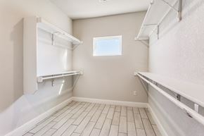 Horseshoe Bay house for rent - the spacious laundry room is equipped with shelves and a window