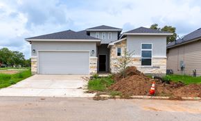 Hondo house for rent - a house with a driveway and a pile of dirt in front of it
