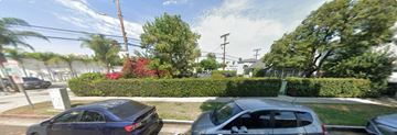 Sherman Oaks apartment for rent - A car is parked on the side of a street.