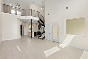 Spring Branch apartment for rent - the spacious living room and entryway of a new home