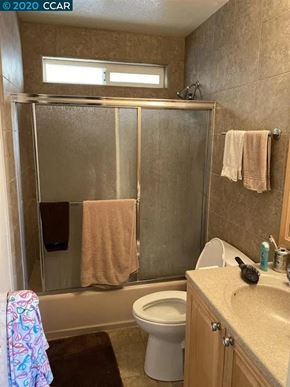 Bay Point apartment for rent - a bathroom with a toilet and a shower and a sink