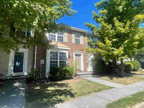 Winchester townhouse for rent - a brick house with a sidewalk in front of it