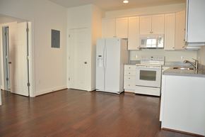 Winchester apartment for rent - an empty kitchen with white appliances and white cabinets