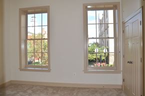 Winchester apartment for rent - a living room with two windows and a door