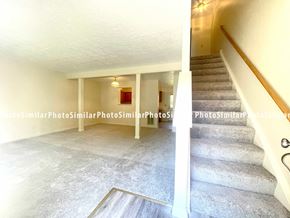 Winchester townhouse for rent - the living room and stairs to the upper level