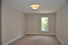 Winchester apartment for rent - A room with a window and a ceiling light.