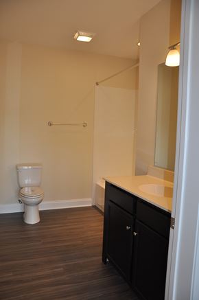 Winchester apartment for rent - a bathroom with a toilet and a sink and a mirror