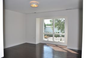 Winchester apartment for rent - A room with a window overlooking a garden.