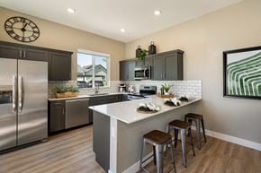 Surprise apartment for rent - updated kitchen with stainless steel appliances and a large island with 3 stools