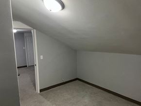 Wahpeton apartment for rent - A room with a white door and a light on the ceiling.