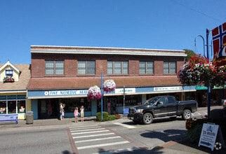 Poulsbo apartment for rent - A street view with a building that has a sign that says "The North Pole".