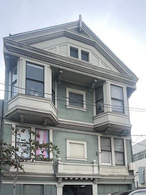 San Francisco apartment for rent - A two-story building with a balcony on the second floor.
