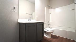 Royse City house for rent - a bathroom with a toilet and a sink