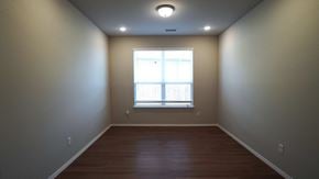 Royse City house for rent - a empty room with a window and wooden floors