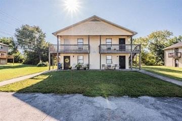 Bowling Green apartment for rent - a white house with a lawn in front of it