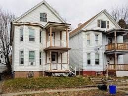 Poughkeepsie apartment for rent - two white houses sitting next to each other