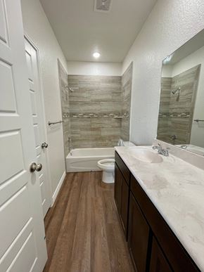 Killeen apartment for rent - a bathroom with a shower toilet and sink