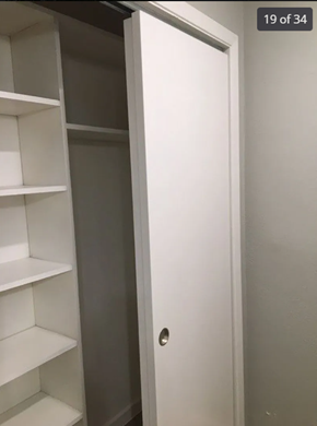 Killeen house for rent - A white door is open to a dark room.
