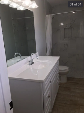 Killeen house for rent - A white sink in a bathroom with a white cabinet.