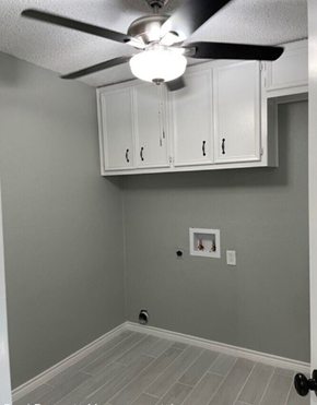 Killeen house for rent - a room with a ceiling fan and white cabinets