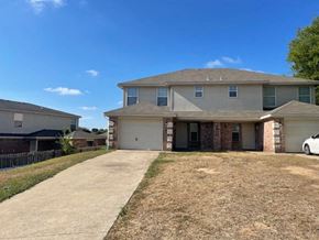 Killeen apartment for rent - a house with a driveway and a car parked in front of it