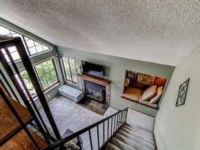 Lakewood house for rent - the view of the living room from the top of the stairs