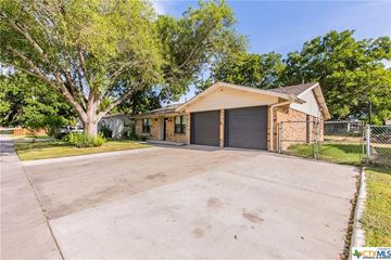 Killeen house for rent - a large driveway in front of a house with a garage door
