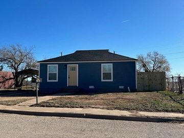 Snyder house for rent - a blue house on the side of the street