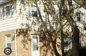 Severn house for rent - a house with a tree in front of it